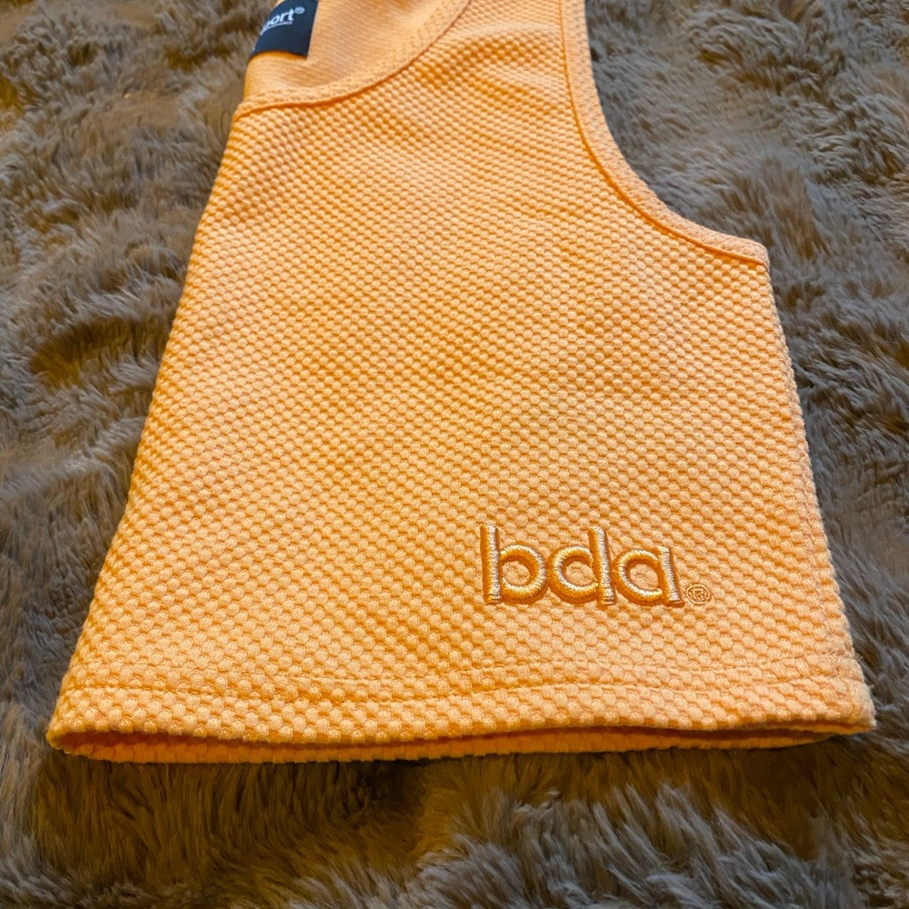 bda® Women's Textured Crop Tank in Peach Orange
